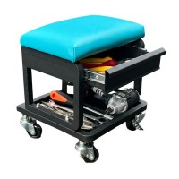 Car repair seat with black drawers with blue cushions